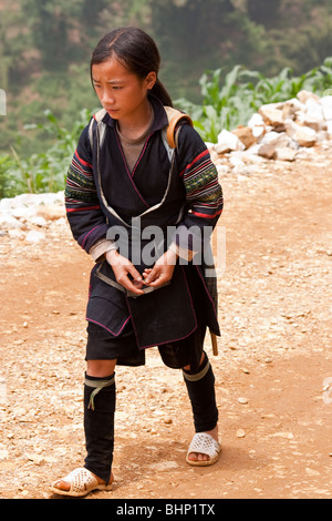 Black H'mong tribal girl from the surrounding hilltribe villages of Sapa, Vietnam Stock Photo