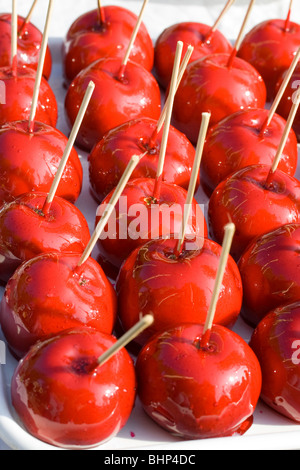 Delicious glazed apples on sticks Stock Photo