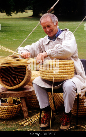 English Crafts, basket making wicker whicker baskets England UK man Stock Photo