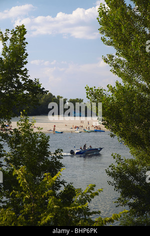 Ukraine, Eastern Europe, Kiev, Sunbathers On Beach In Hydropark On Dnipro River Stock Photo