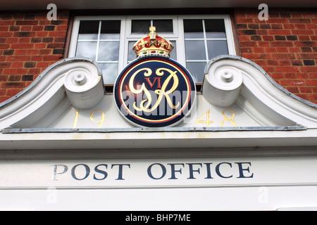 George VIs royal cypher on the Post Office and General Store, Crown Estate village, Windsor Great Park, Windsor, Berkshire, England, Great Britain, UK Stock Photo