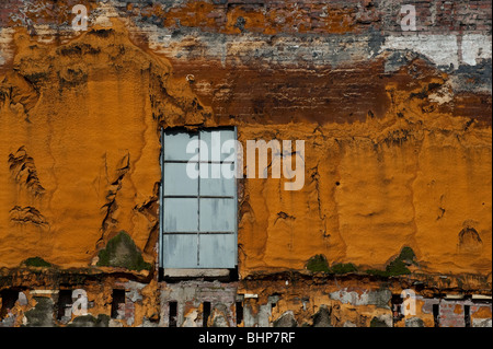 In the Georgetown neighborhood of Seattle, Washington, the old Ranier brewery building is being torn down. A nice grunge effect. Stock Photo