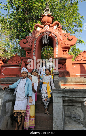 children in Balinese Hindu Temple, Melanting Temple, Pemuteran, Bali, Indonesia Stock Photo