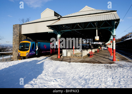 Oxenholme The Lake District Railway Station in the Winter Snow  The Train for Windermere Stock Photo
