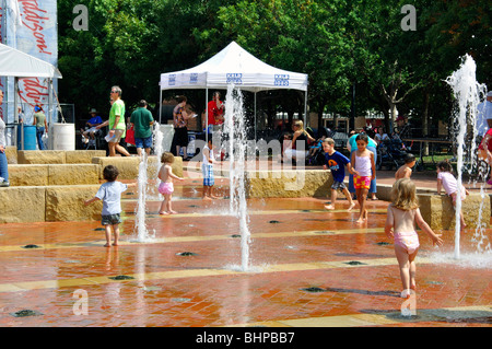 Kids playing in fountain, Texas, USA Stock Photo