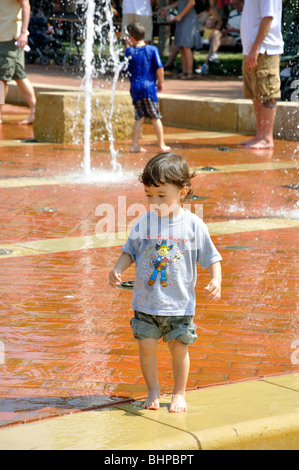 Kids playing in fountain, Texas, USA Stock Photo