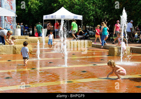 Kids playing in fountain, Texas, USA Stock Photo