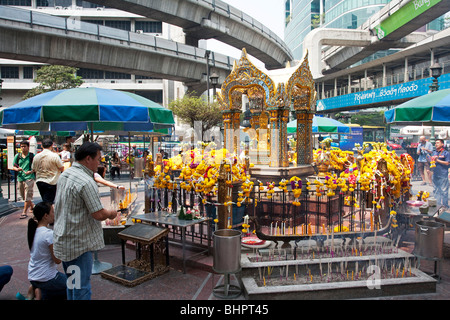 The Erawan Shrine is a Hindu shrine in Bangkok, Thailand Stock Photo