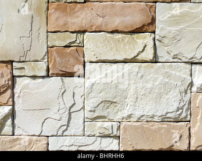 Closeup shot of house wall made from cut stone blocks Stock Photo