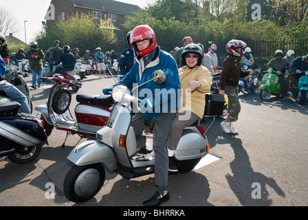 Senior couple on scooter at motor rally, Birminham Stock Photo
