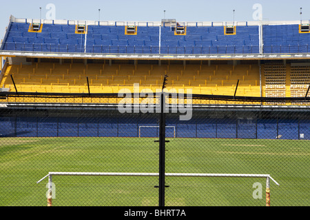 stand and pitch behind security fencing in the interior of Alberto J Armando la bombonera stadium home to atletico boca juniors Stock Photo