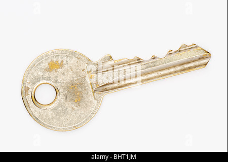 A worn silver Yale key Stock Photo