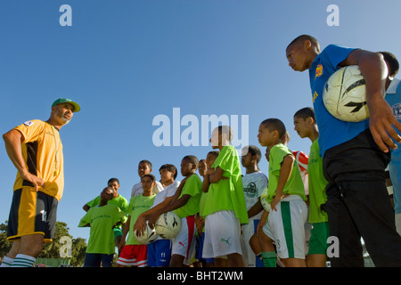 Coach instructing players at Old Mutual Football Academy, Cape Town, South Africa Stock Photo