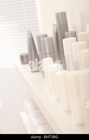 Hair and body care cosmetics white and gray bottles, shallow depth-of-field Stock Photo