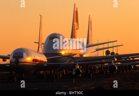 Remains of TWA Boeing 747s and McDonnell Douglas DC-10 airliners sit as if in a take-off queue at the Mojave storage facility. Stock Photo