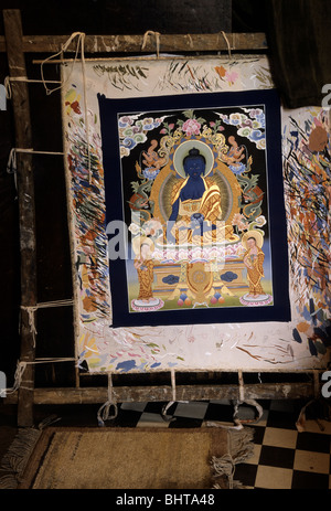 Thangka (Tibetan silk painting) in artists' shop in the UNESCO World Heritage town of Bhaktapur- Kathmandu Valley,  Nepal Stock Photo