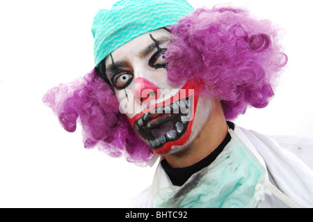 Close up portrait of clown celebrating Dutch carnival with hideous make-up Stock Photo