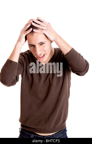 Stressed young man with a headache isolated on white Stock Photo