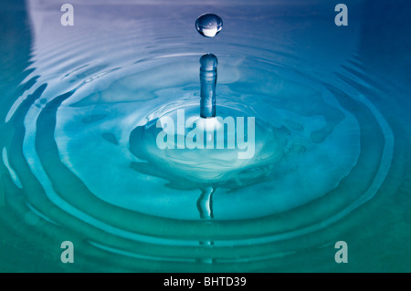 A drop of water hitting the surface Stock Photo