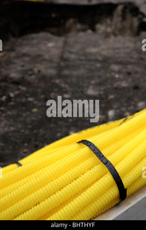 New yellow plastic domestic gas supply pipe. Stock Photo