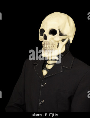 Dude in a jacket and a mask - death, isolated on black background Stock Photo