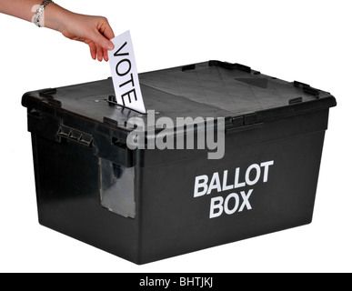 Ballot box, hand placing a vote into a ballot box, voting with ballot box Stock Photo