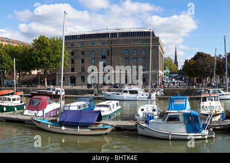 Bristol Docks with the Arnolfini Gallery and a glimpse of St Mary Redcliffe church Stock Photo