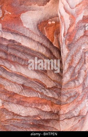 Colorful layers of sandstone at the archaeological city of Petra, Wadi Musa, Jordan. Stock Photo