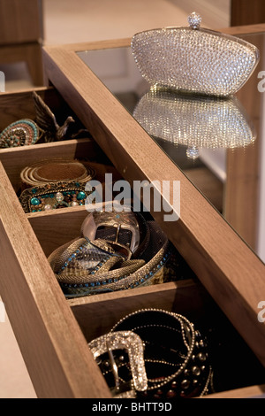 Close-up of open drawer storing jewelery in modern dressing table Stock Photo