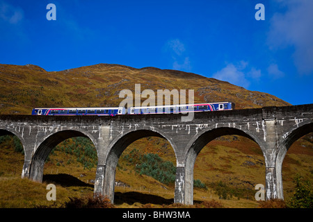 First Scotrail diesel passenger train travelling over Glenfinnan Viaduct, Lochaber, Scotland, UK, Europe Stock Photo