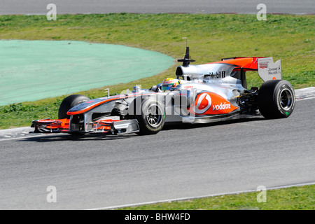 Lewis Hamilton driving for the McLaren–Mercedes team during testing at the Circuit de Catalunya, Montmelo, Spain 2010 Stock Photo