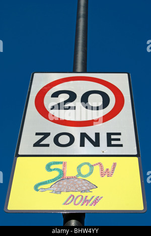 british road sign indicating 20mph zone with illustration of tortoise, in shepherd's bush, west london, england Stock Photo