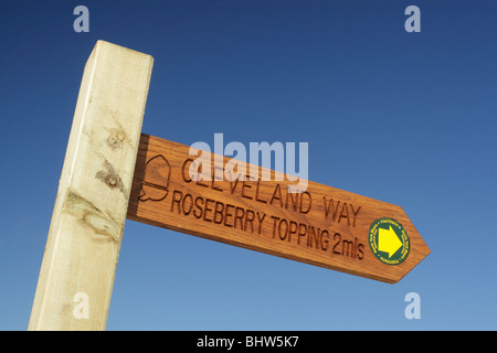 Wooden public bridleway sign pointing to Roseberry Topping on the Cleveland Way long distance walk Stock Photo