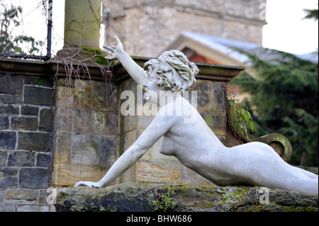 Marble statue of nymph at York House, Twickenham, Middlesex. These are originally from the Italian studio of Orazio Andreoni. Stock Photo