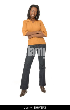 Attractive woman standing, on white background, smiling with arms folded. Stock Photo