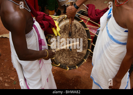 cylindrical percussion instrument named chenda Playing by two musicians in a  traditional hindu temple Festival at Kerala,India Stock Photo