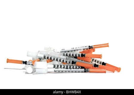 Pile of disposable diabetic hypodermic syringes Stock Photo