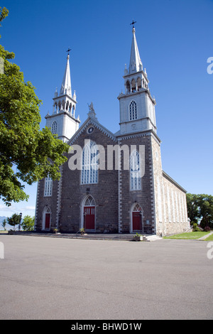 Eglise Notre-Dame-de-Bonsecours built in 1768 in L'Islet-sur-Mer is typical of towering French-inspired stone churches Quebec Stock Photo