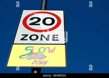 british road sign indicating 20mph zone with illustration of tortoise, in shepherd's bush, west london, england Stock Photo