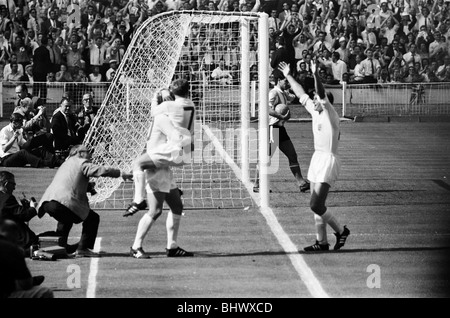 England v Argentina World Cup Quarter Final Wembley Stadium, London 23rd July 1966. England players celebrate Geoff Hurst's Stock Photo