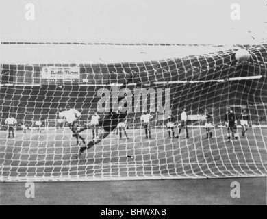 World Cup 1966 in England Russia v Portugal football match Eusebio scores from penalty. Scoring a goal Football in the net  MSI Stock Photo
