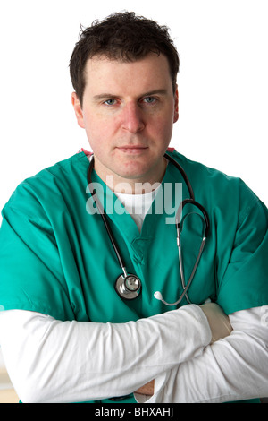 man wearing medical scrubs and stethoscope with arms folded and neutral expression Stock Photo