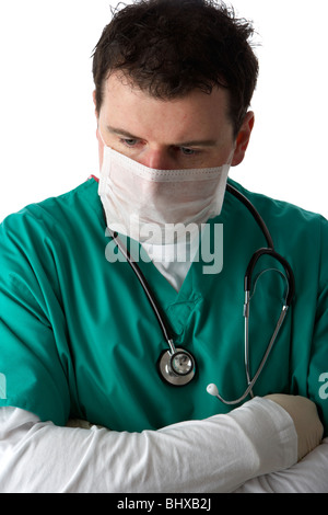 man wearing medical scrubs wearing face mask and hair net Stock Photo ...