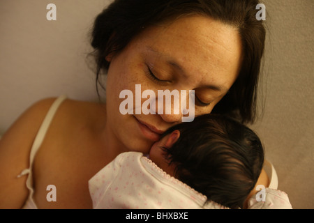 Mother cradles her baby for the first time at Martha Jefferson Hospital in Charlottesville, Virginia. Stock Photo