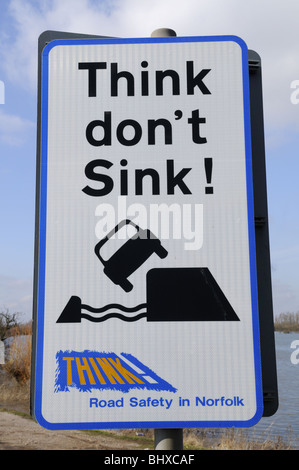 Think Don't Sink warning sign at a flooded A1101 at Welney Wash, Norfolk, England UK Stock Photo