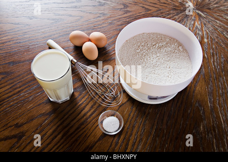 ingredients for pancakes in a table Stock Photo