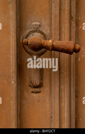 Old rusty door buckle Stock Photo