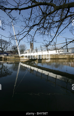 City of Derby, England. Swing bridge over the River Derwent with, Derby Cathedral, and Cathedral Green in the background. Stock Photo