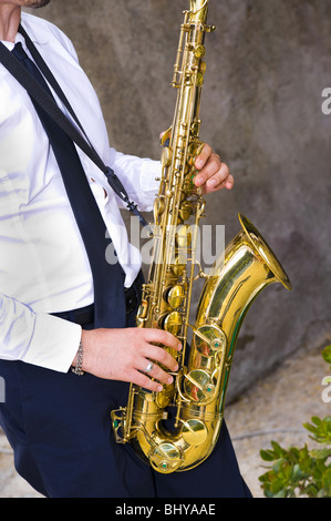 Saxophone player playing music Stock Photo