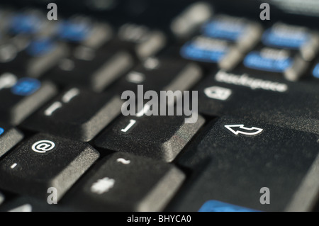 Close up of Enter Key on Black Computer Keyboard Stock Photo
